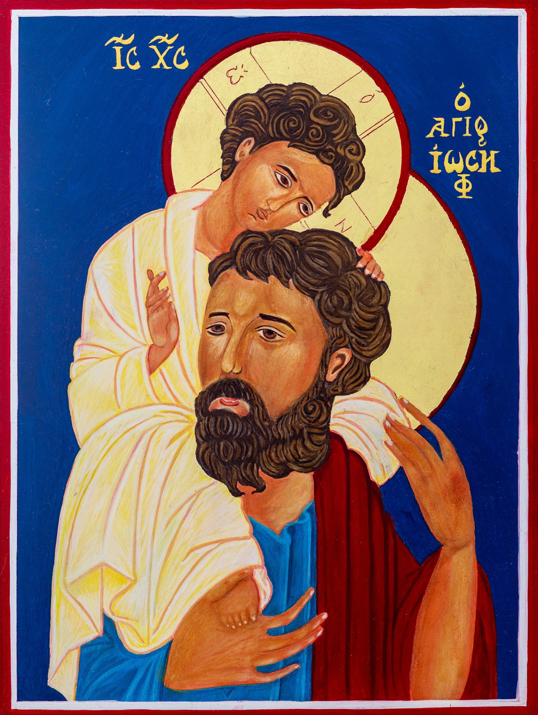 Icône de saint Joseph portant l'Enfant Jésus, fond bleu, bordure rouge, inscriptions grecques